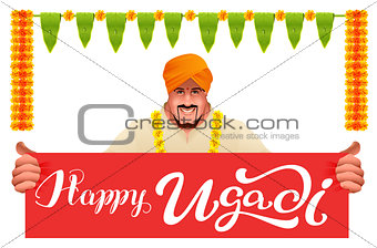 Hindu man holds banner happy ugadi