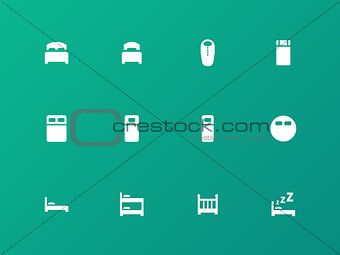 Bed, bunk and sleeping bag icons on green background.