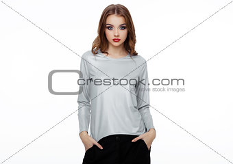 Beautiful fashion model wearing silver top 