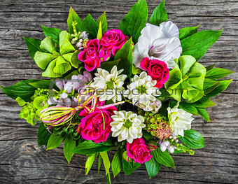 wedding bouquet with roses and white gerberas, view from above