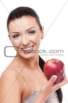 Beautiful girl with red apple