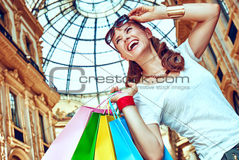 Fashion woman with shopping bags in Galleria Vittorio Emanuele