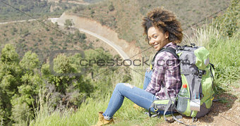 Beautiful female traveler on mountain