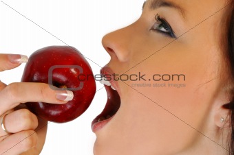 attractive woman eating an apple