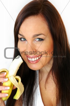 brunette eating a banana