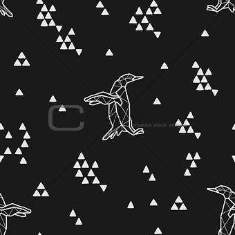 Seamless black and white kids tribal vector pattern with penguins and triangles.