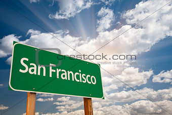 San Francisco Green Road Sign Over Clouds