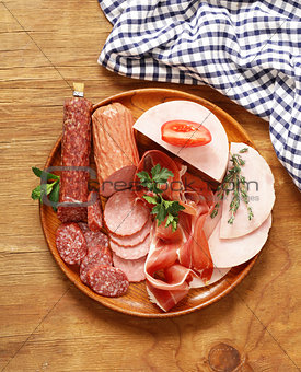 Assortment of meat delicacies (salami, parma, ham)