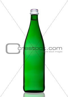 Green bottle of sparkling mineral water on white