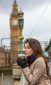 Woman Drinking Coffee on Westminster Bridge, Big Ben, London, En