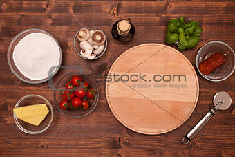 Ingredients to make a pizza at home - top view