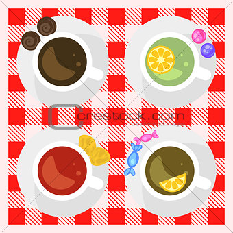 Set of coffee and tea cups top view on a checkered tablecloth surface.