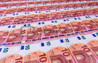 Small ten euro bills layer in low angle perspective