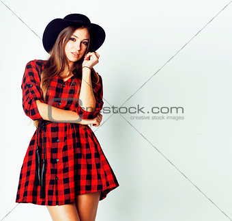young pretty brunette girl hipster in hat on white background casual close up dreaming smiling, lifestyle people concept