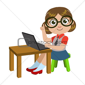 Girl In Glasses Sitting At The Desk With Lap Top, Part Of Kids And Modern Gadgets Series Of Vector Illustrations