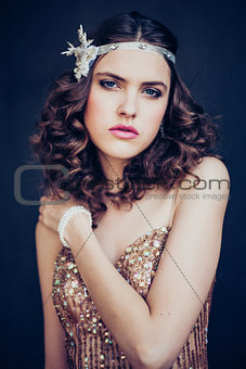 Fashion photo of beautiful girl wearing sparkling evening dress