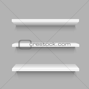 Three simple white shelves
