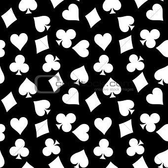 Seamless pattern background of white poker suits - hearts, clubs, spades and diamonds - on black background. Casino gambling theme vector illustration