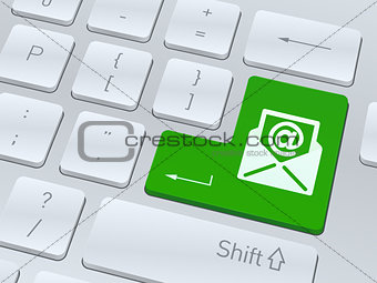 Email sign concept on button of white computer keyboard.