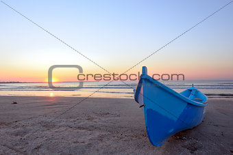 Fishing boat and sunrise 