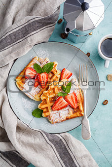 Homemade waffles with strawberries