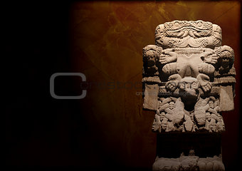 Grunge background with Aztec goddess of death Coatlicue