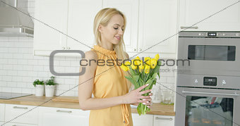 Tender female holding bouquet