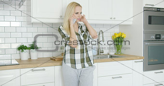 Young woman talking by phone