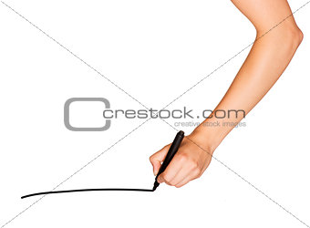 A female hand holds black marker and draws line