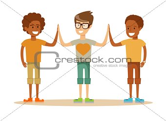mixed-race Pupils giving each other a high five