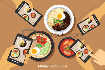 People take a photo of korean food with smartphone