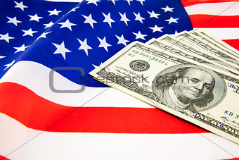 American dollars and flag.