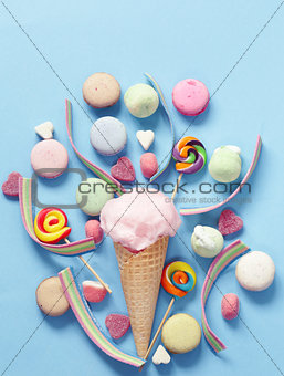 Sweet cotton candy in a waffle cone, candy and jelly sweets