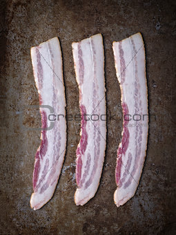 rustic uncooked bacon