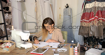 Dressmaker in process of working