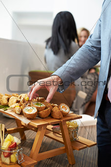 Close Up Of Businessman At Conference Lunch Buffet