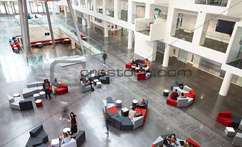 Elevated view of seating in a university atrium, motion blur