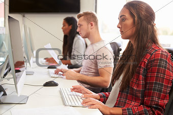 Group Of University Students Using Online Resources