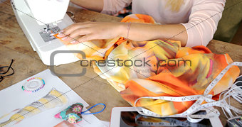 Crop female sewing