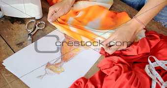 Crop female using cloth sketch