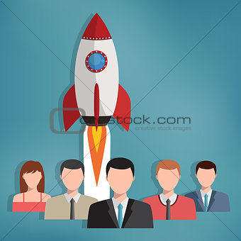 Group of business people with rocket behind them.
