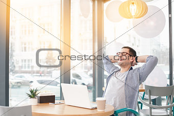 Young stylish man in cafe