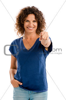 Happy mature woman pointing
