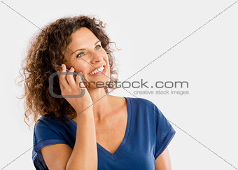 Happy woman talking at phone