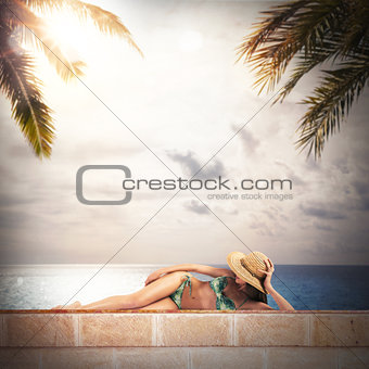 Girl in bikini sunbathes