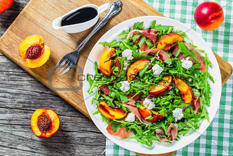 peaches, arugula, prosciutto and goat cheese salad with balsamic