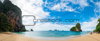 Beach Phra Nang on a sunny day panoramic view, tourists in the f