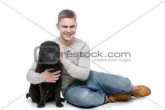 Boy with shar pei dog