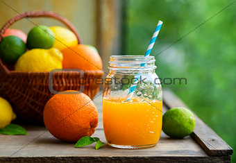 Fresh orange juice in a glass jar