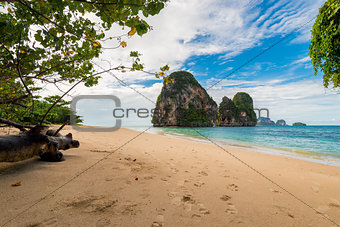 A deserted sandy beach and a beautiful cliff in the Sea, Thailan